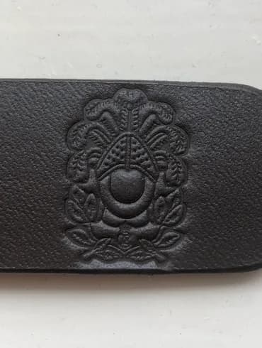 Intricate stamp on leather belt
