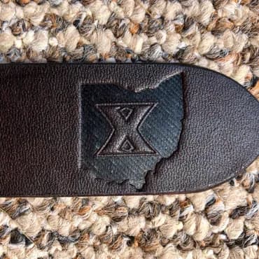 Intricate stamp on leather belt